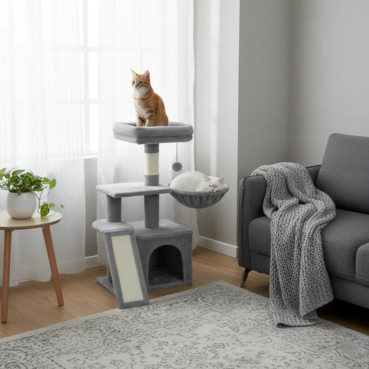 Arbre à chat pas cher gris, avec un chat sur le perchoir observant la pièce et un autre dans la niche. Parfait pour 1 ou 2 chats, compact et design.