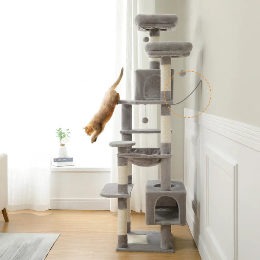 Grand arbre à chat stable fixé au mur avec kit anti-basculement, chat en train de sauter, sécurité optimale pour foyers multi-chats actifs.
